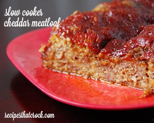 One of our MOST popular crock pot meatloaf recipes! Do you love meatloaf and want a quick and easy crock pot recipe? This Slow Cooker Cheddar Meatloaf is a delicious twist on your favorite meatloaf recipe!