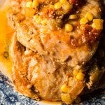 Fiesta Slow Cooker Pork Chops Recipe: One of our favorite quick and easy crock pot recipes. Ready to cook in 5 minutes . Flavorful and tender chops with a fiesta twist!