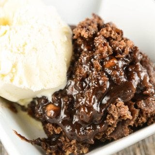 Crock Pot Hot Fudge Peanut Butter Cake is the perfect chocolate and peanut butter dessert. The result is much like a chocolate lava cake with an added layer of peanut butter chips to make it even more decadent.