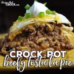 This delicious Crock Pot Beefy Tostada Pie is so easy to make! It is a great way to switch up taco night and everyone will be asking for more!