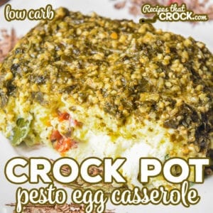 Our Crock Pot Pesto Egg Casserole is an easy low carb breakfast casserole with fluffy eggs, savory pesto, tomatoes, basil and mozzarella cheese.