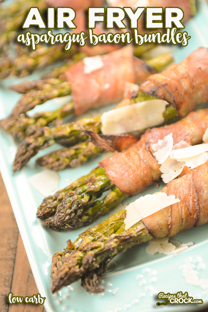 Our Air Fryer Asparagus Bacon Bundles are an easy low carb side dish or appetizer you can make in a traditional air fryer, Ninja Foodi or air fry oven. You'll love these bundles of fresh asparagus wrapped in crispy salty bacon topped with shaved Parmesan cheese. via @recipescrock