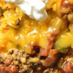 Our Crock Pot Taco Chili is a hearty soup with savory beef, tomatoes, peppers and zucchini. Taco seasoning and cumin add a smoky flavor to this zesty twist on traditional chili.