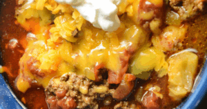 Our Crock Pot Taco Chili is a hearty soup with savory beef, tomatoes, peppers and zucchini. Taco seasoning and cumin add a smoky flavor to this zesty twist on traditional chili.
