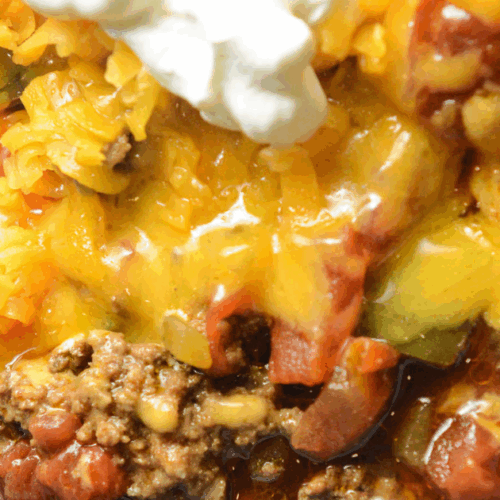 Our Crock Pot Taco Chili is a hearty soup with savory beef, tomatoes, peppers and zucchini. Taco seasoning and cumin add a smoky flavor to this zesty twist on traditional chili.