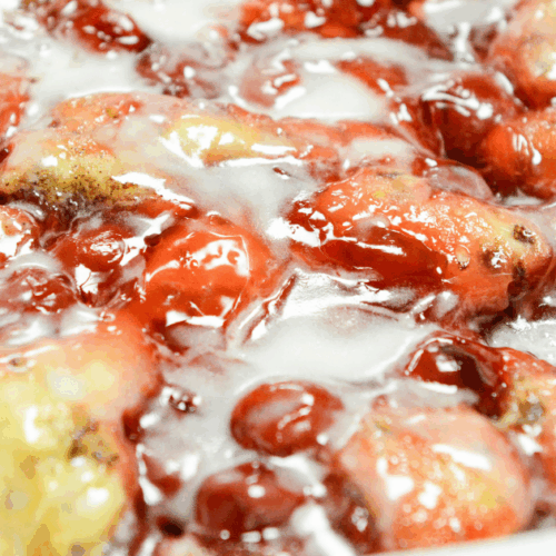 Our Cinnamon Roll Crock Pot Cherry Cobbler is so good you will NOT believe it only has two simple ingredients. This is a fantastic sweet treat for breakfast or dessert and is impressive enough for the holidays! No one will know how easy it was to throw together!