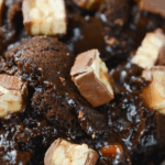 These slow cooker recipes are a great way to enjoy leftover Halloween candy. These leftover Halloween candy crock pot recipes turn your favorite candies into delicious homemade cakes, bars, treats and beverages. So whether you raid your kiddo's candy stash or stock up on seasonal sales, we have you covered with the best Crock Pot Halloween Candy Recipes!