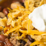 Are you looking for a great crock pot taco soup? This recipe has the perfect combination of beans, tomatoes and meat in a savory, flavorful tomato base.
