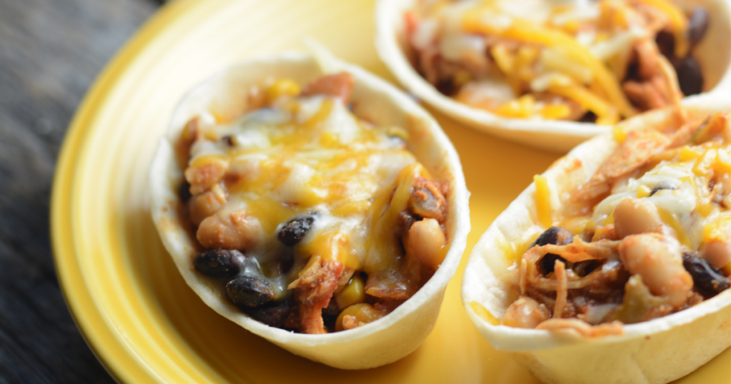 Are you looking for recipes your teen can make on their own? Start here! The Easiest Crockpot Chicken Tacos Ever is the perfect beginner recipe for teens. With just 5 minutes of prep and a handful of simple ingredients the slow cooker does all the work. This dump-and-go meal is so delicious that everyone will be asking for seconds (and asking your teen for the recipe!). A great way to build kitchen confidence and get kids excited about cooking. Perfect for busy weeknights too!