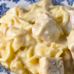 This Crockpot Chicken Stroganoff is the easy crockpot dinner your family will request every week! Made with just 6 simple ingredients and only 5 minutes of prep, this creamy chicken recipe is perfect for busy weeknights. A kid-friendly meal that's pure comfort food, tender chicken in a rich, creamy sauce served over egg noodles. Save this pin for your next easy dinner idea! 🍽️